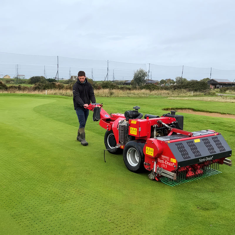 Trevor Dennis using his Redexim Carrier and Verti-Drain 1513